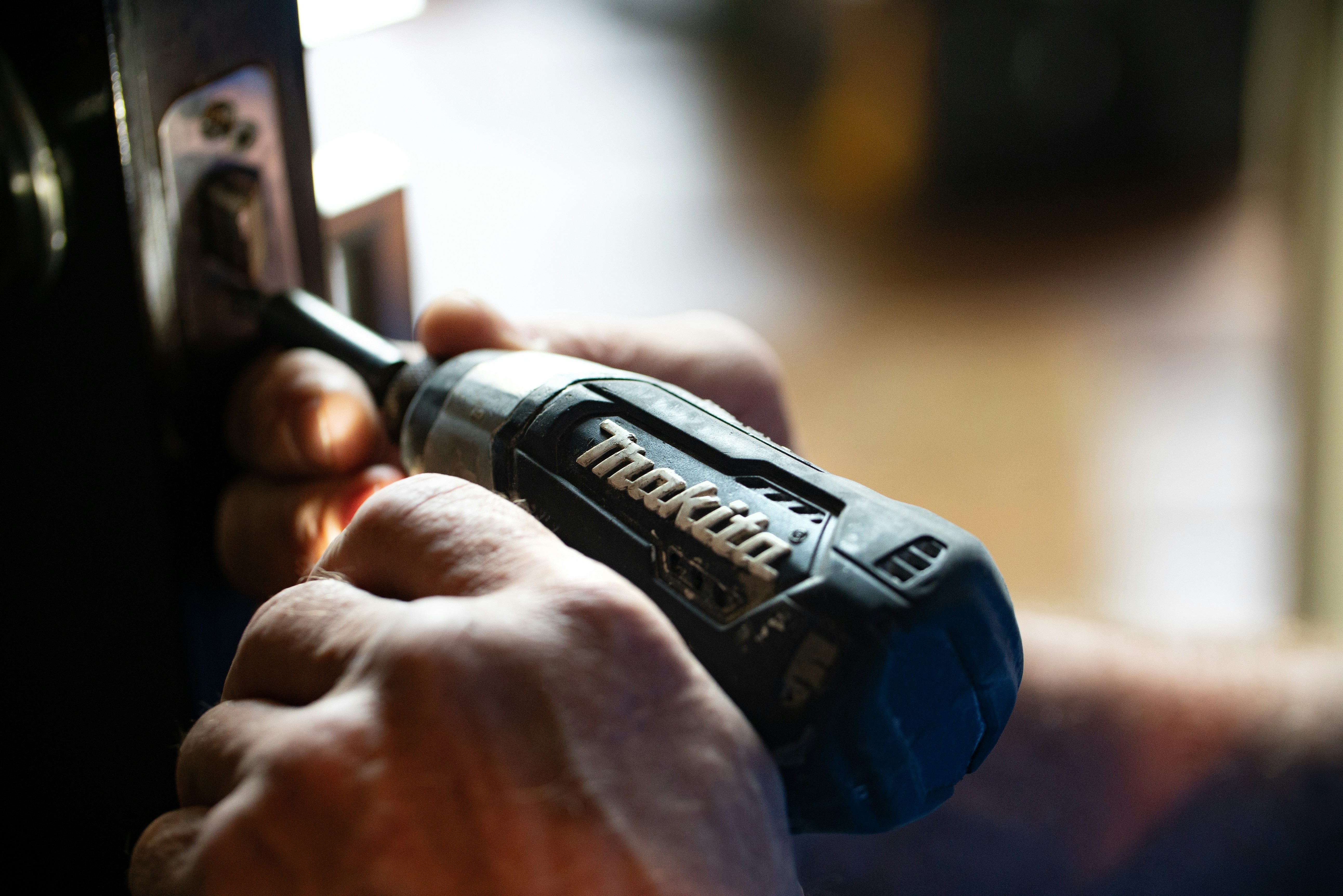 Handyman performing home repair